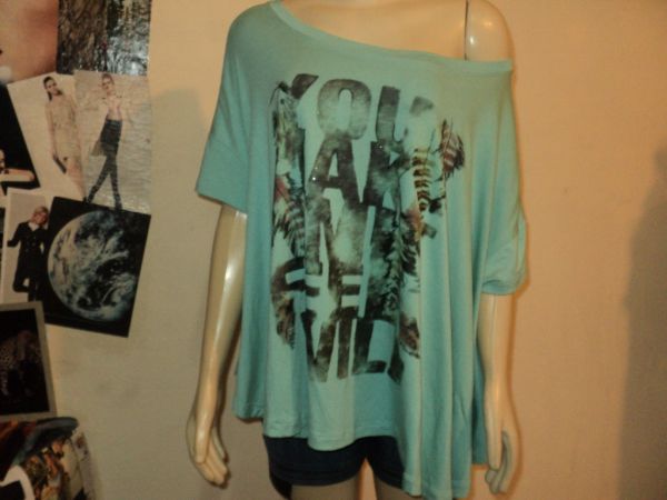 Blusa em malha, cor verde, estampa na frente