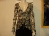 Blusa transparente estampa em onça, tam. P